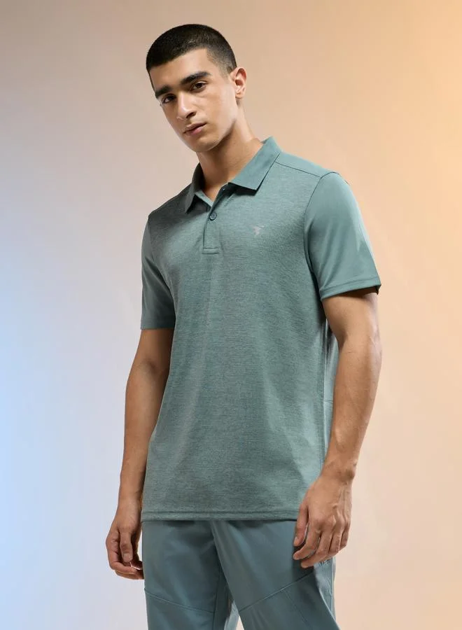تكنوسبورت تيشيرت بولو رجالي سليم فيت ميلانج أخضر من تكنوسبورت
