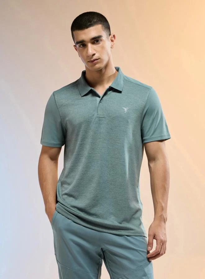 تكنوسبورت تيشيرت بولو رجالي سليم فيت ميلانج أخضر من تكنوسبورت
