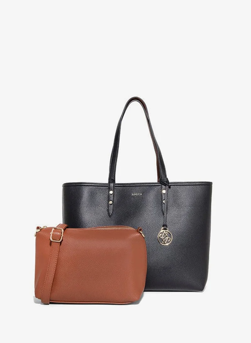 أميكا AMICA Léonie Reversible Tote Bag in Soft Leather with Pouch in Black & Tan