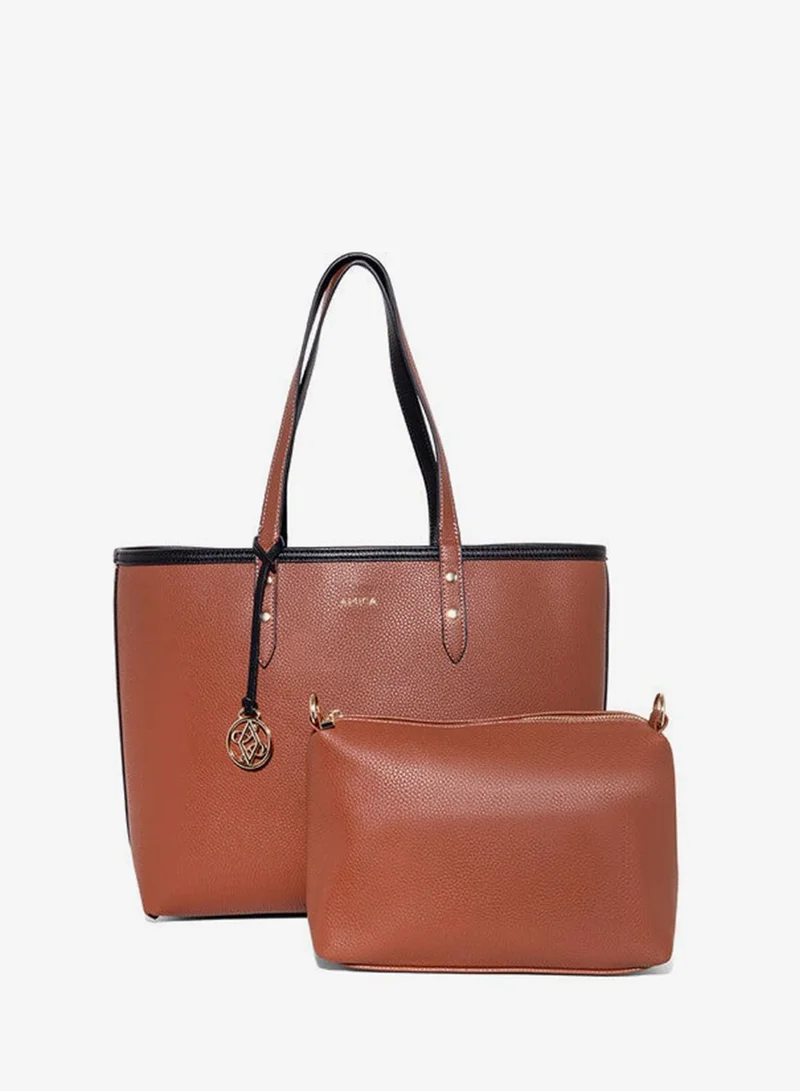 أميكا AMICA Léonie Reversible Tote Bag in Soft Leather with Pouch in Black & Tan