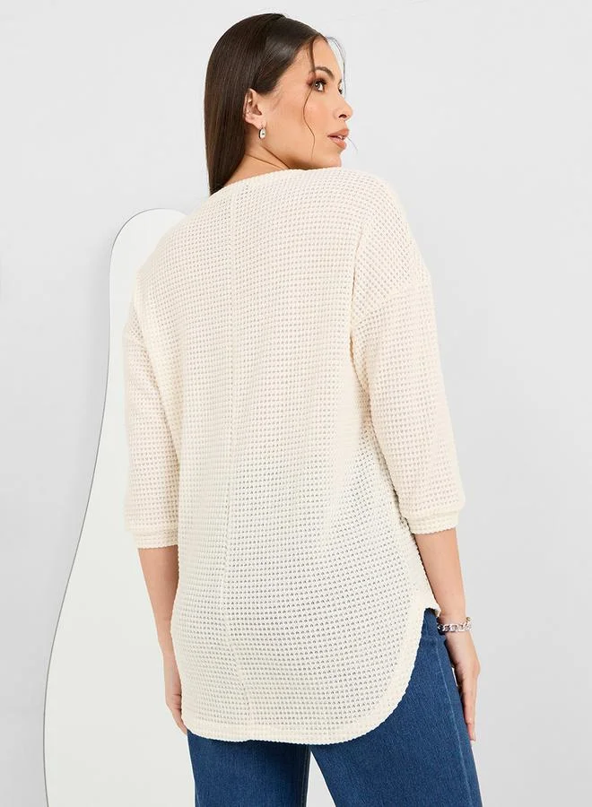 Styli Oversized Solid Textured Curved Hem T-Shirt