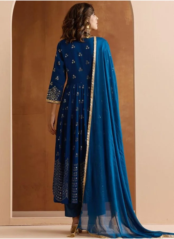 ISHIN Elastic Women Blue Georgette Kurta Set with Embroidered pattern Tunic and Palazzo features a Round neckline and Three-Fourth Sleeve secured with Elastic closure and styled in Straight Fit ideal for Festive moments — a must-have for your statement wardrobe.
