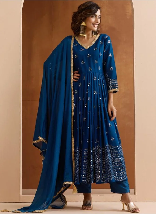 ISHIN Elastic Women Blue Georgette Kurta Set with Embroidered pattern Tunic and Palazzo features a Round neckline and Three-Fourth Sleeve secured with Elastic closure and styled in Straight Fit ideal for Festive moments — a must-have for your statement wardrobe.