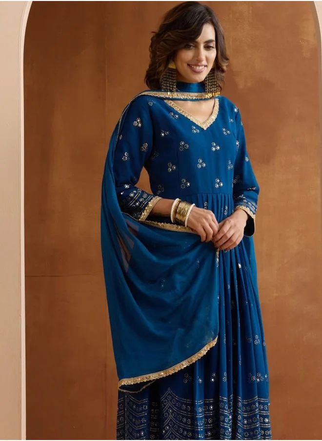 ISHIN Elastic Women Blue Georgette Kurta Set with Embroidered pattern Tunic and Palazzo features a Round neckline and Three-Fourth Sleeve secured with Elastic closure and styled in Straight Fit ideal for Festive moments — a must-have for your statement wardrobe.