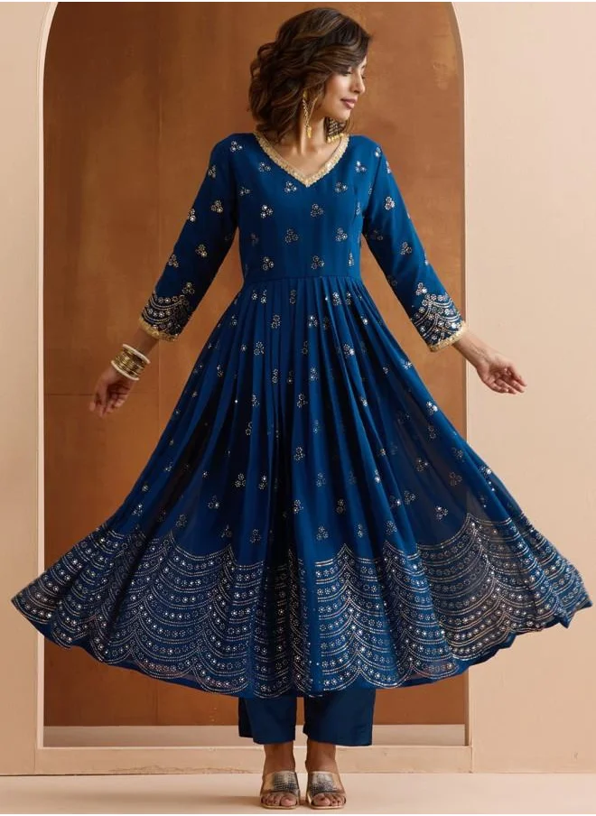 آي شين Elastic Women Blue Georgette Kurta Set with Embroidered pattern Tunic and Palazzo features a Round neckline and Three-Fourth Sleeve secured with Elastic closure and styled in Straight Fit ideal for Festive moments — a must-have for your statement wardrobe.