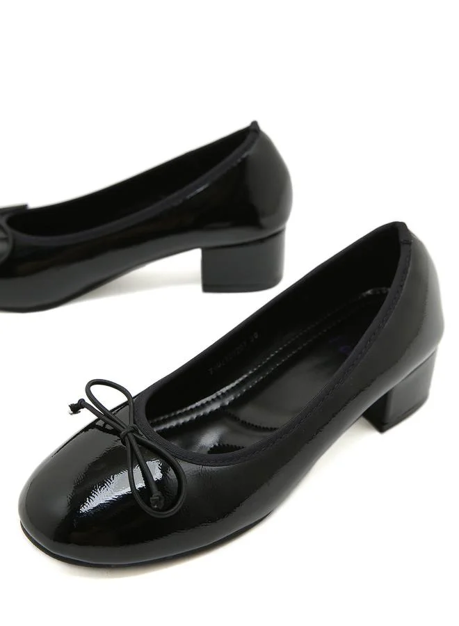 Sneak-a-Peek Patent Round Toe Block Heel Shoes by Styli