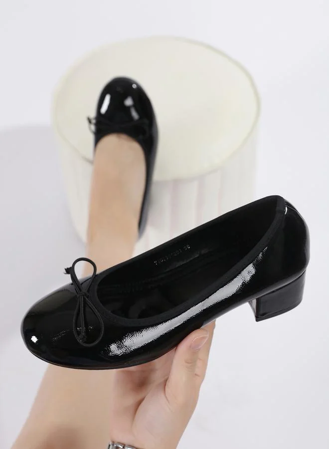 Sneak-a-Peek Patent Round Toe Block Heel Shoes by Styli