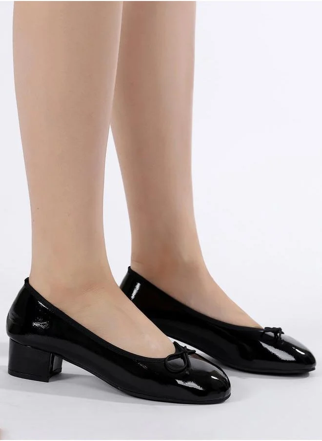 Sneak-a-Peek Patent Round Toe Block Heel Shoes by Styli