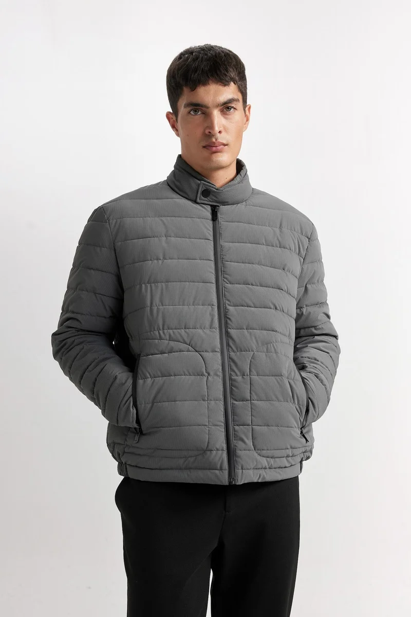 Defacto  Slim Fit Stand Collar Zippered Puffer Jacket for Men | Best Price UAE