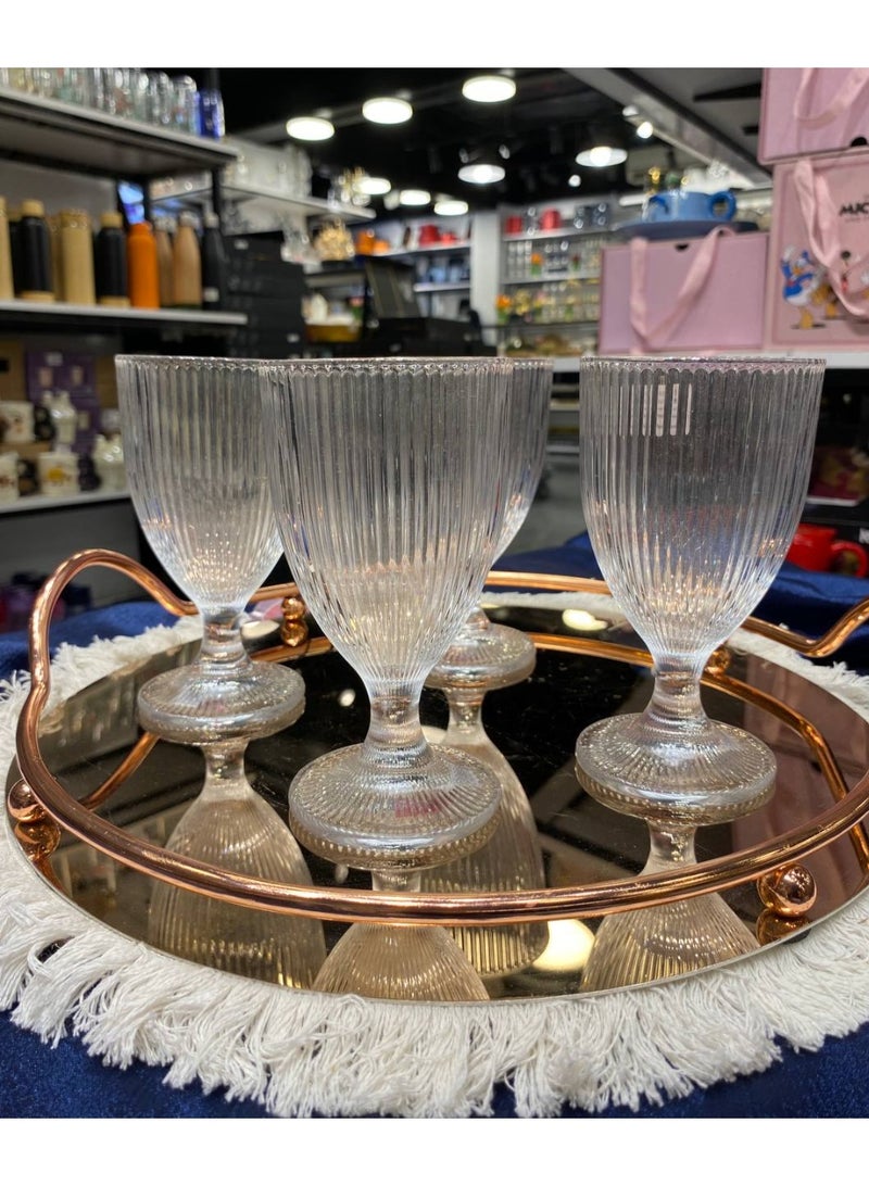 A set of exquisitely elegant, ribbed crystal glasses. Six stunning crystal glasses that add a touch of glamour to any space. Perfect for juice, water, or even ice cream. Their modern design and captivating sparkle. - Image 2