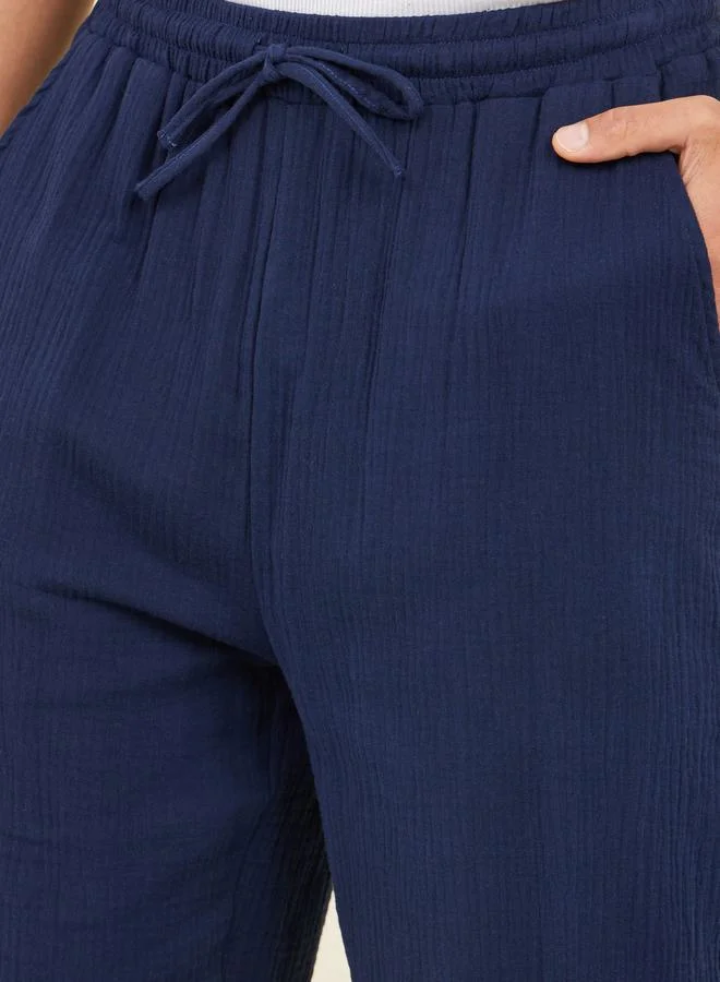 ستايلي بنطلون بنقوش بجيوب جانبية