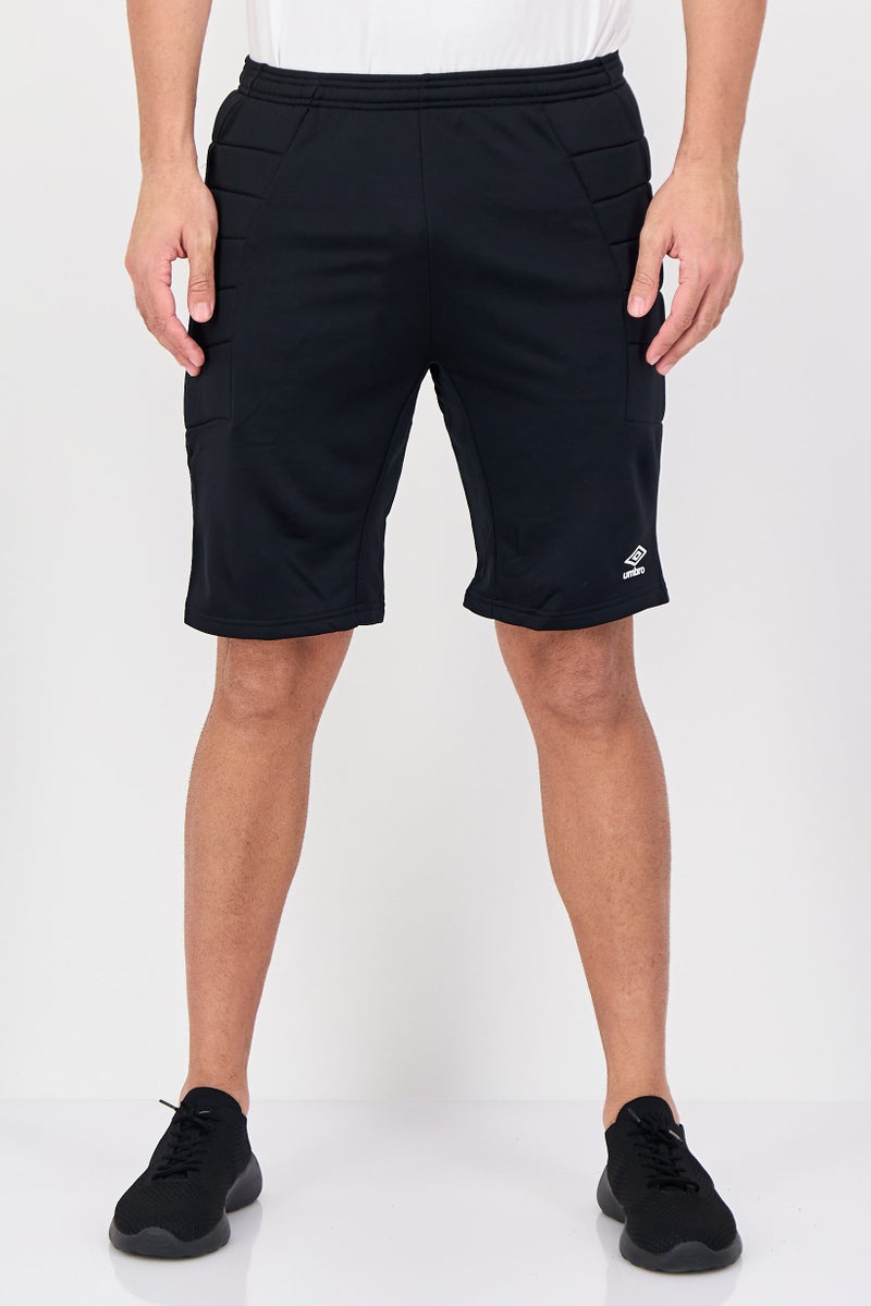 umbro Men Sportswear Fit Padded Football Goalkeeper Shorts, Black - Image 1