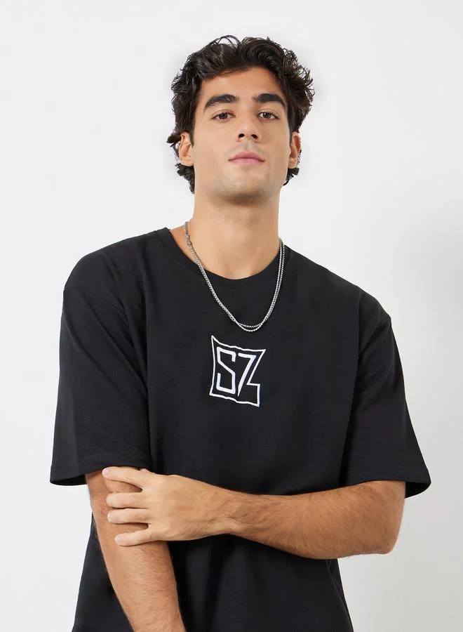 Styli Men Black Oversized Embroidered Terry T-Shirt