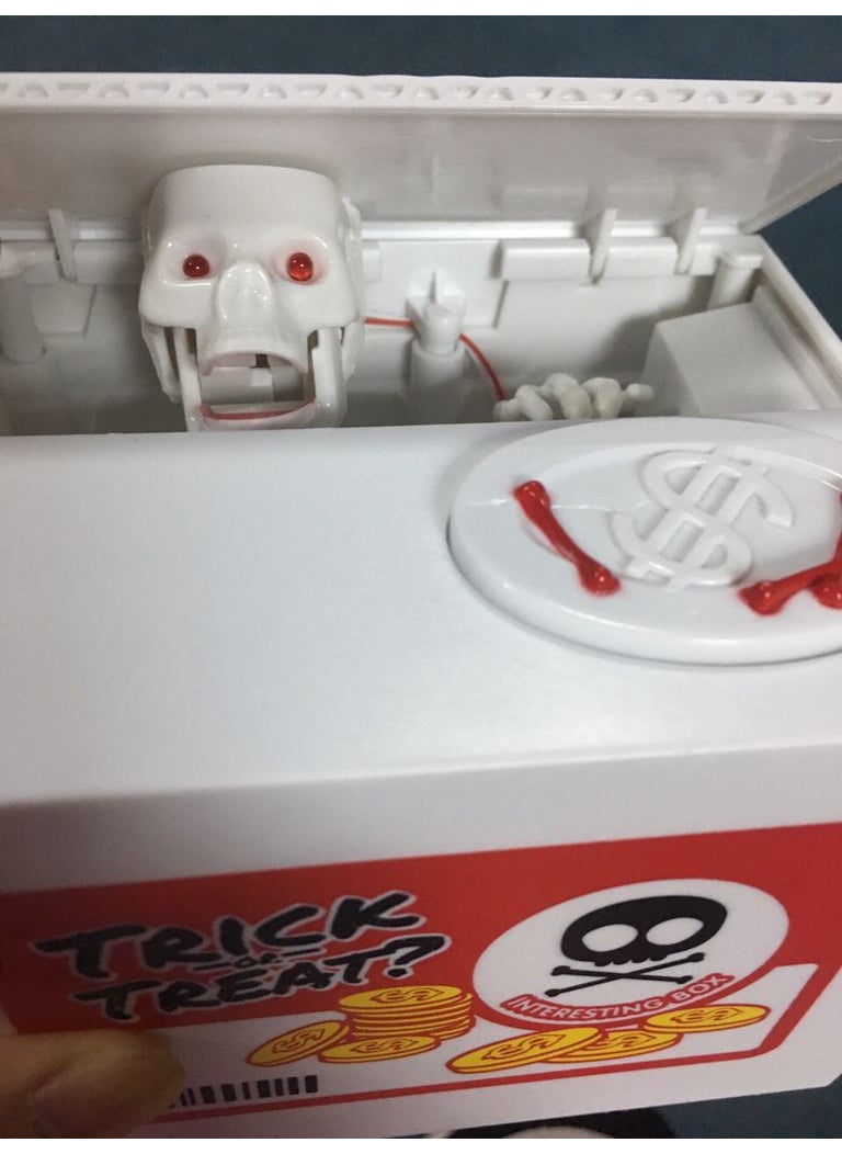 Generic - EVIL SPIRITS BANK will be called Skull ghost piggy BANK stealing money cat stealing money Ghost Trick piggy BANK Pink Cute Cat - Image 1