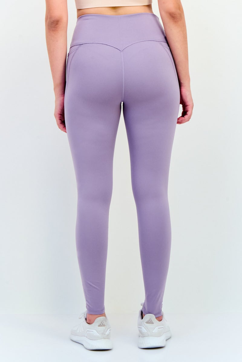 PUMA سروال ليجنغ رياضي نسائي مناسب باللون الأرجواني الفاتح - Image 3