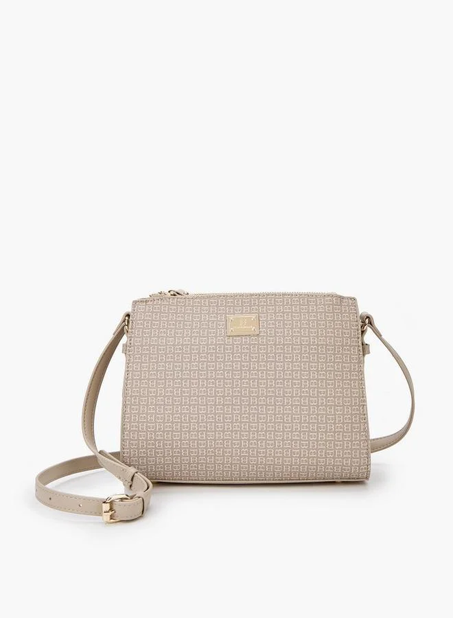 فلورا بيلا من شو إكسبرس حقيبة كروس بودي بطبعة شعار مع حزام قابل للتعديل