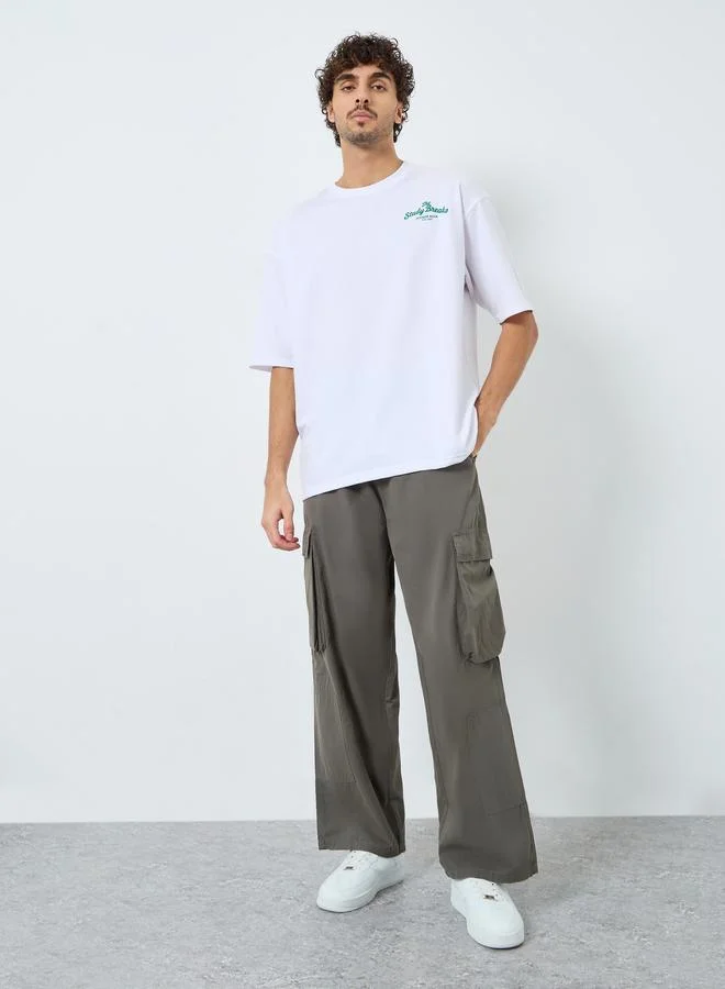 Styli Styli Men White Front Chest and Back Print Oversized Terry T-Shirt