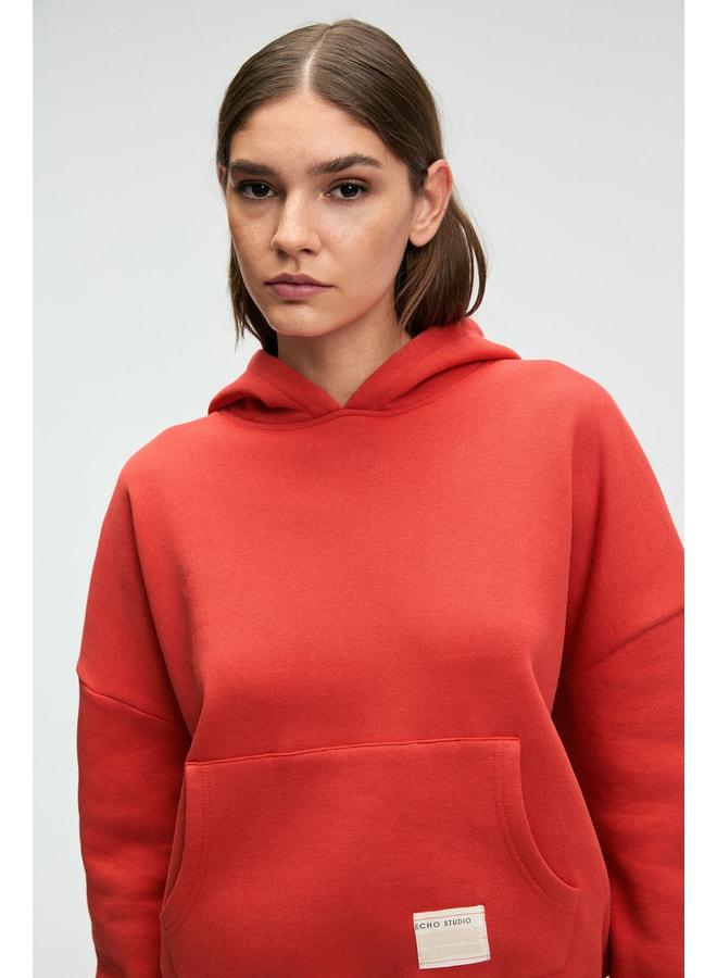 GRIMELANGE CLARIE Women's Organic Cotton Oversize Kangaroo Pocket Hooded Red Sweatshirt. - Image 1