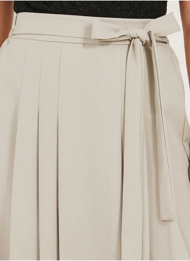 Styli Pleated A-Line Midi Skirt with Tie-Up Detail