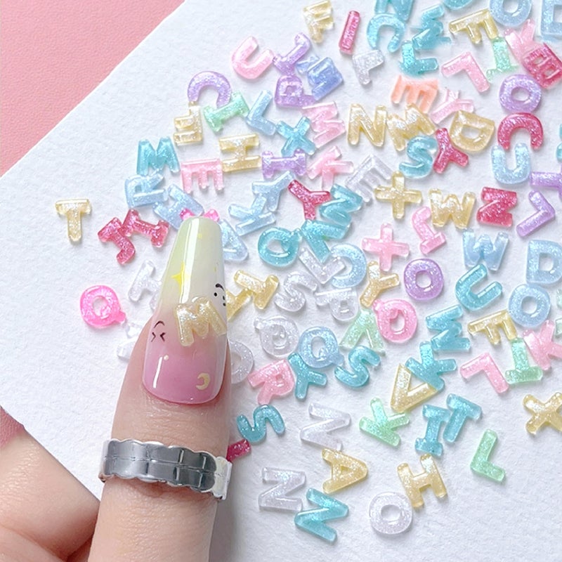 Quezadyl 300Pcs Letter Nail Art Charms Random Candy Color Letter Resin Nail Rhinestones Kawaii Mini Flatback Alphabet Nail Gems with Aurora Glitter Design Nail Art Accessories for DIY Craft Nail Supplies - Image 2