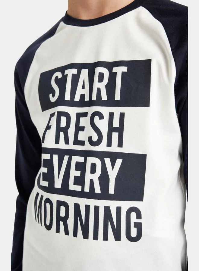 ديفاكتو Graphic Print Reglan Sleeve T-Shirt & Pyjama Set by Styli
