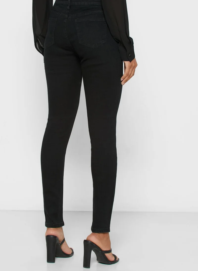 Ginger Button Fly Ripped Skinny Jeans