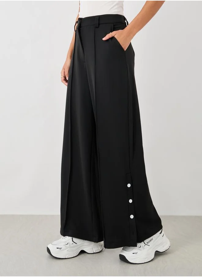 ستايلي Styli Solid Pin Tuck Detail Wide Leg Pants with Side Seam Buttons