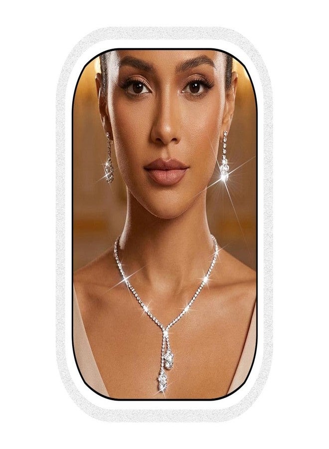 يونيكرا طقم مجوهرات زفاف من الفضة والكريستال من يونيكرا برايد، يتضمن قلادة وأقراط، وقلادة تشوكر مرصعة بأحجار الراين للنساء والعرائس (مجموعة من 3 قطع). - Image 1