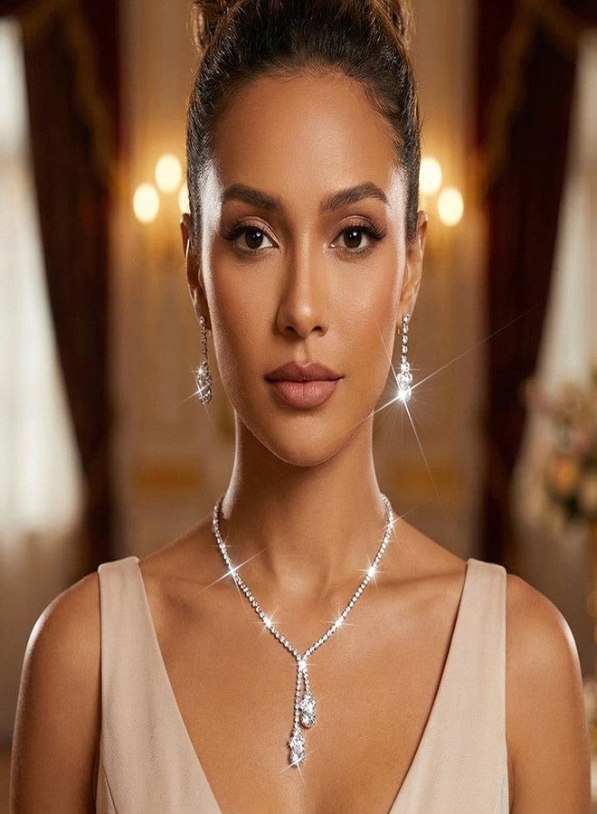 يونيكرا طقم مجوهرات زفاف من الفضة والكريستال من يونيكرا برايد، يتضمن قلادة وأقراط، وقلادة تشوكر مرصعة بأحجار الراين للنساء والعرائس (مجموعة من 3 قطع). - Image 2