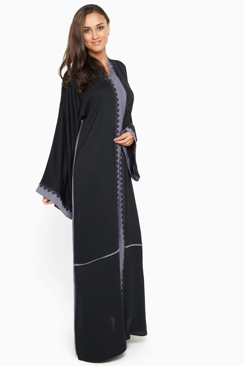 النخبة A gorgeous abaya with grey satin stripe detail by the sleeves and closure .-AJ594A