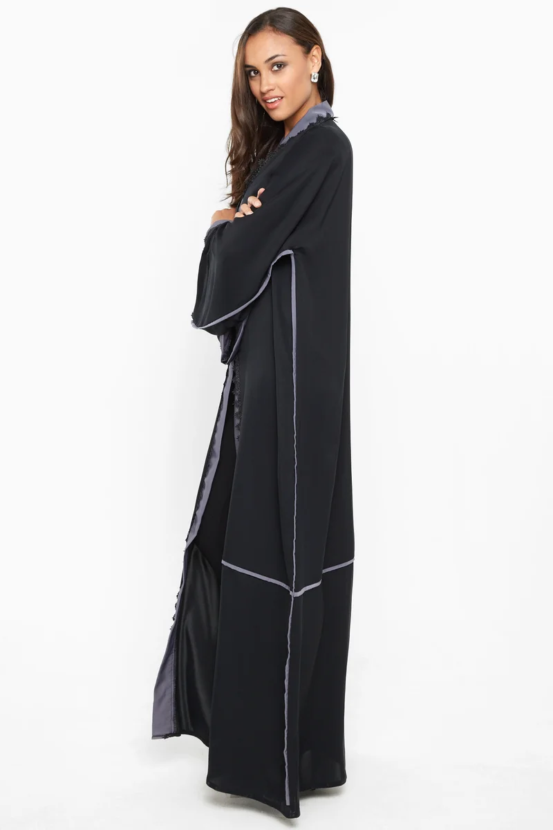 النخبة A gorgeous abaya with grey satin stripe detail by the sleeves and closure .-AJ594A