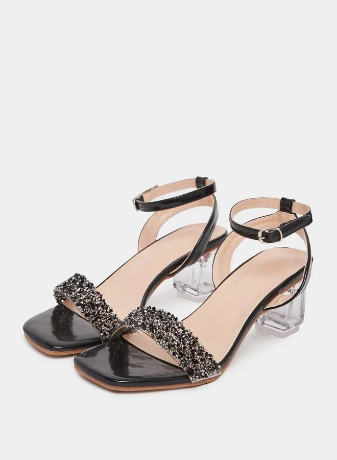 تايك تو صندل بكعب شفاف مزين بحزام كاحل