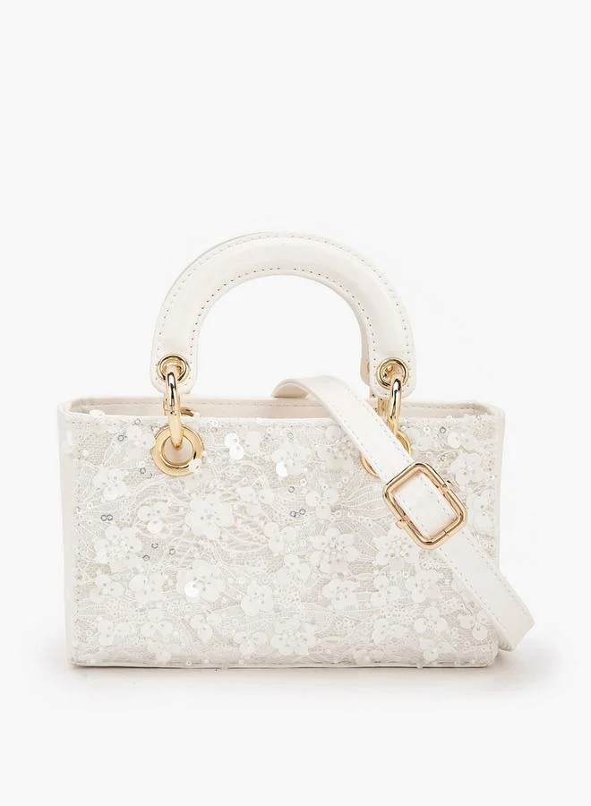 فلورا بيلا من شو إكسبرس حقيبة كروس بودي مزينة بالترتر بتصميم زهور من مجموعة رمضان بحزام قابل للفصل