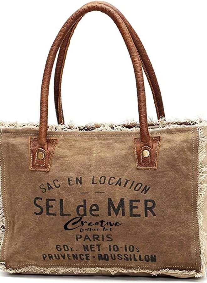 CREATIVE LEATHER ART CLA Bags Sel De Mer Upcycled Canvas Hand Bag Upcycled Canvas & Cowhide Tote Bag Radiant Upcycled Canvas & Cowhide Leather Bag, Khaki - Image 1