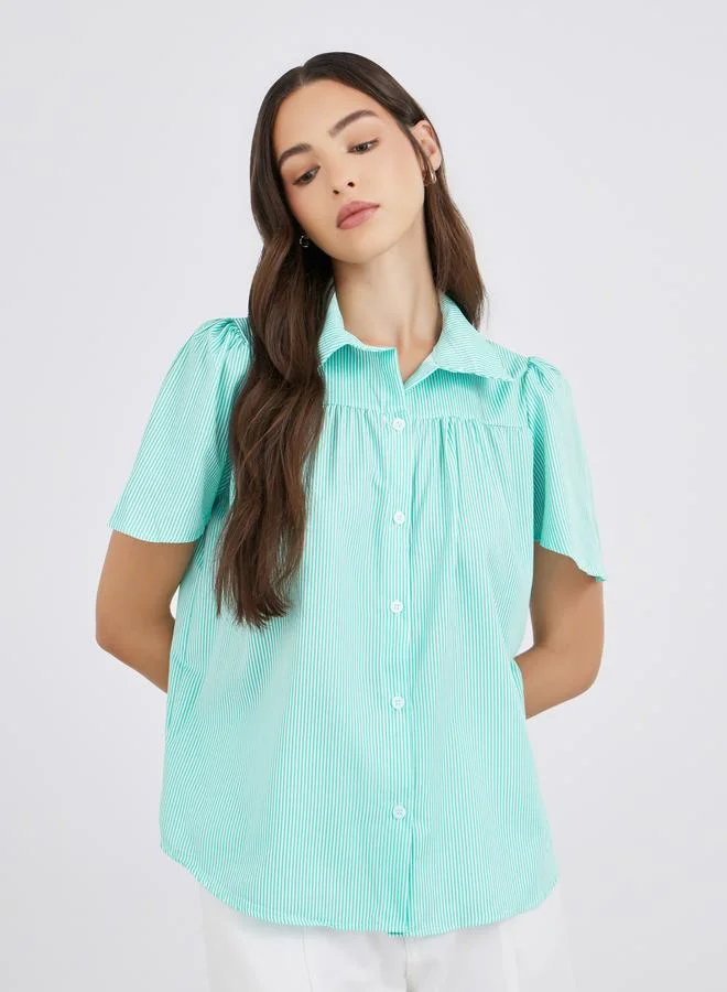 تايك تو قميص واسع بأزرار وخطوط مخططة