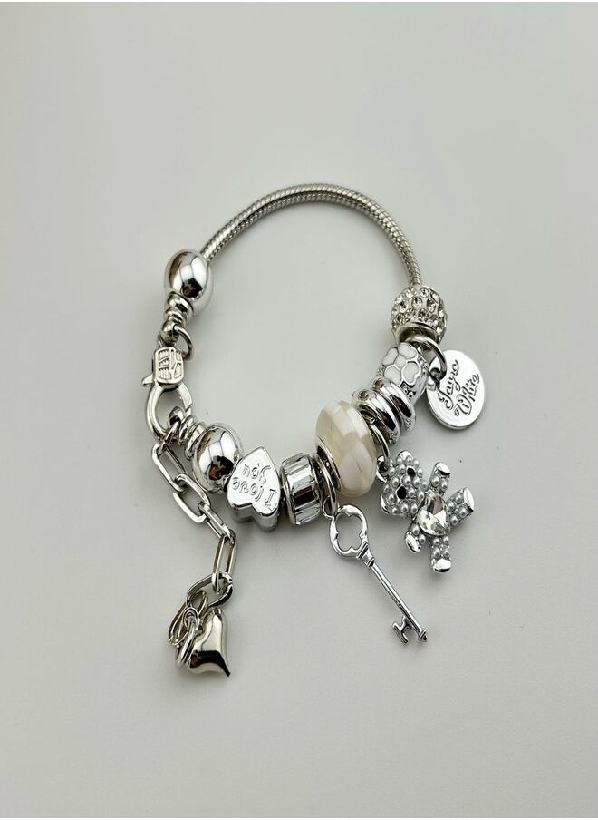 Generic Elegant silver bracelet adorned with romantic charms and luxurious touches  - Image 2