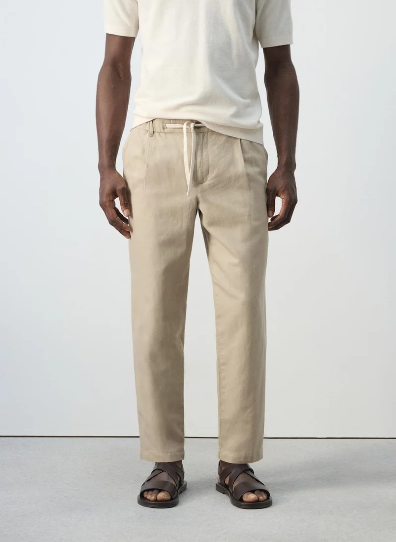 مانجو مان Slim Fit Cropped Linen-Cotton Trousers