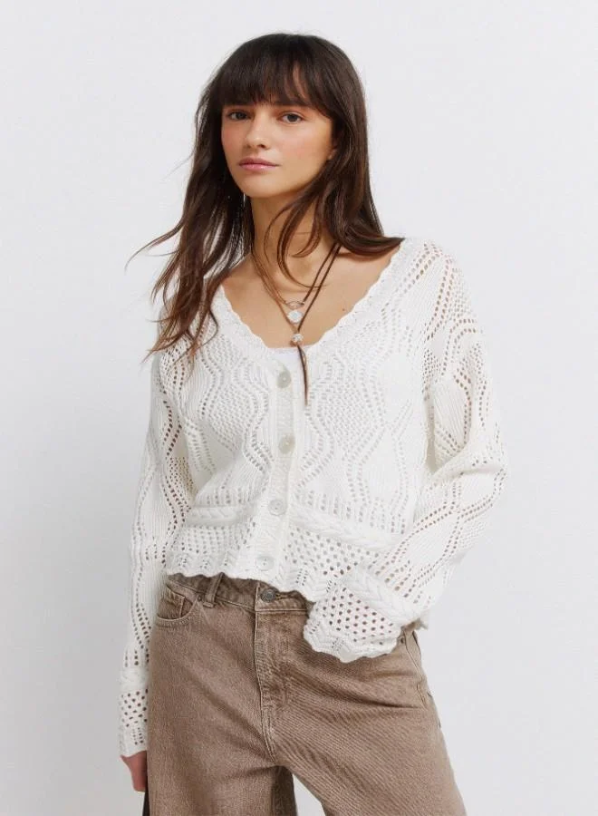 White pointelle knit V-neck volume long sleeve openwork ribbed front button cardigan