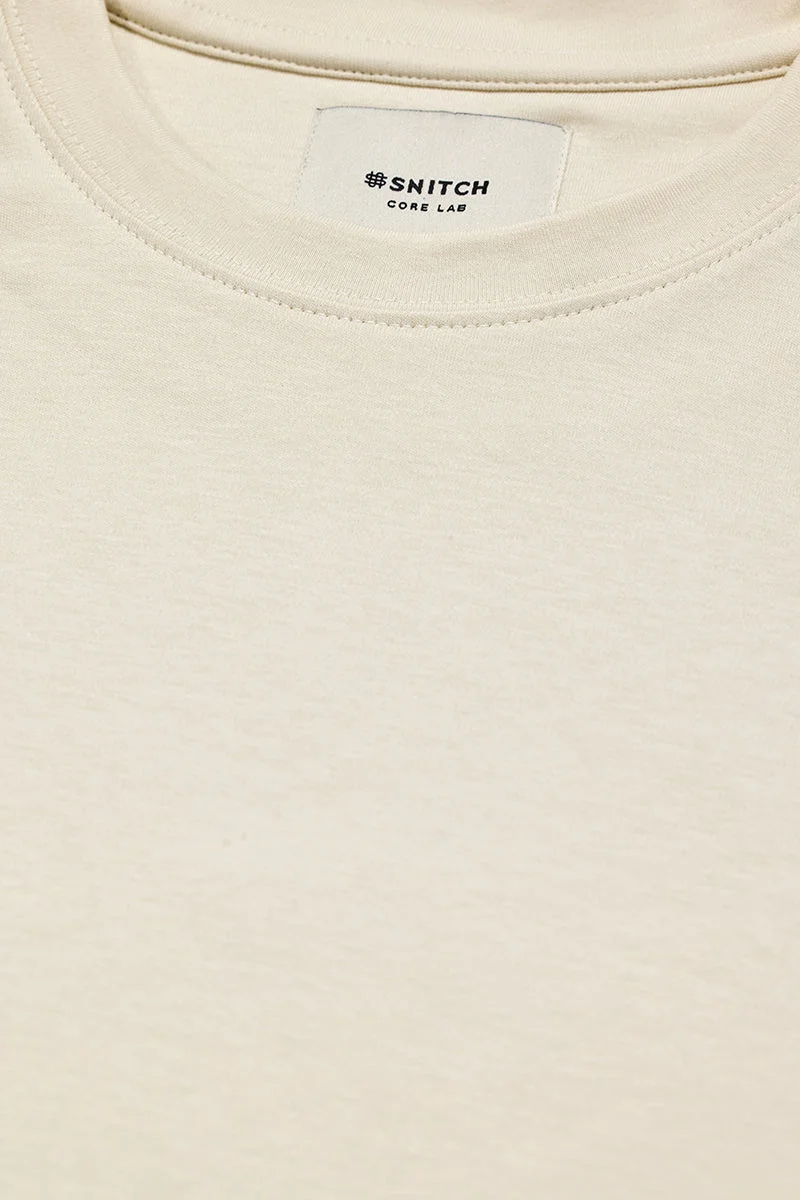 SNITCH Cream Core Lab Cream Solid Oversized Fit T-Shirt for Men | Best Price UAE