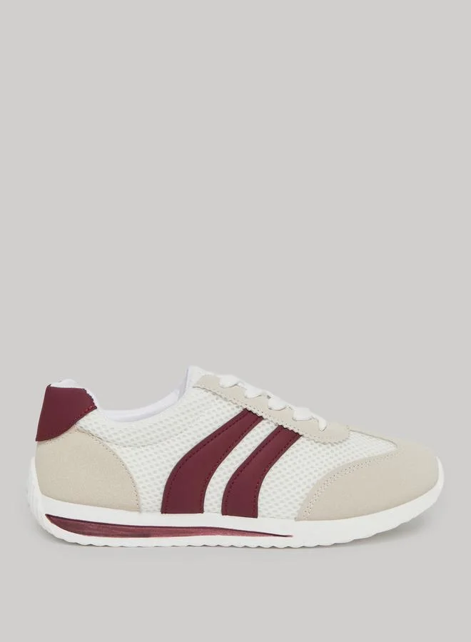 تايك تو حذاء رياضي مخطط برباط وأجزاء متداخلة