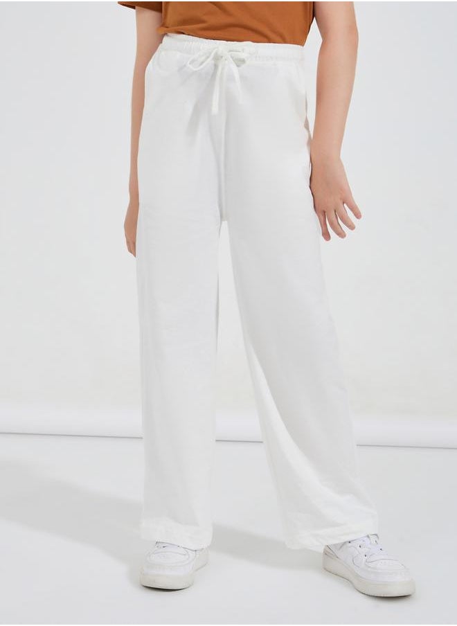 Basic Wide Leg Joggers with Drawstring - pzsku/ZE0E8C0D6F206DB809A58Z/45/_/1731072510/68dc6697-8839-466a-9f57-a77c1dfcc23f