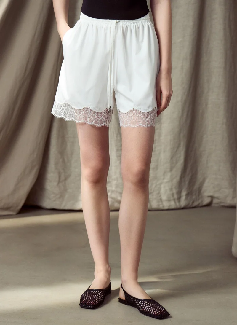 Lichi  Satin mini shorts with lace cuffs for Women | Best Price UAE