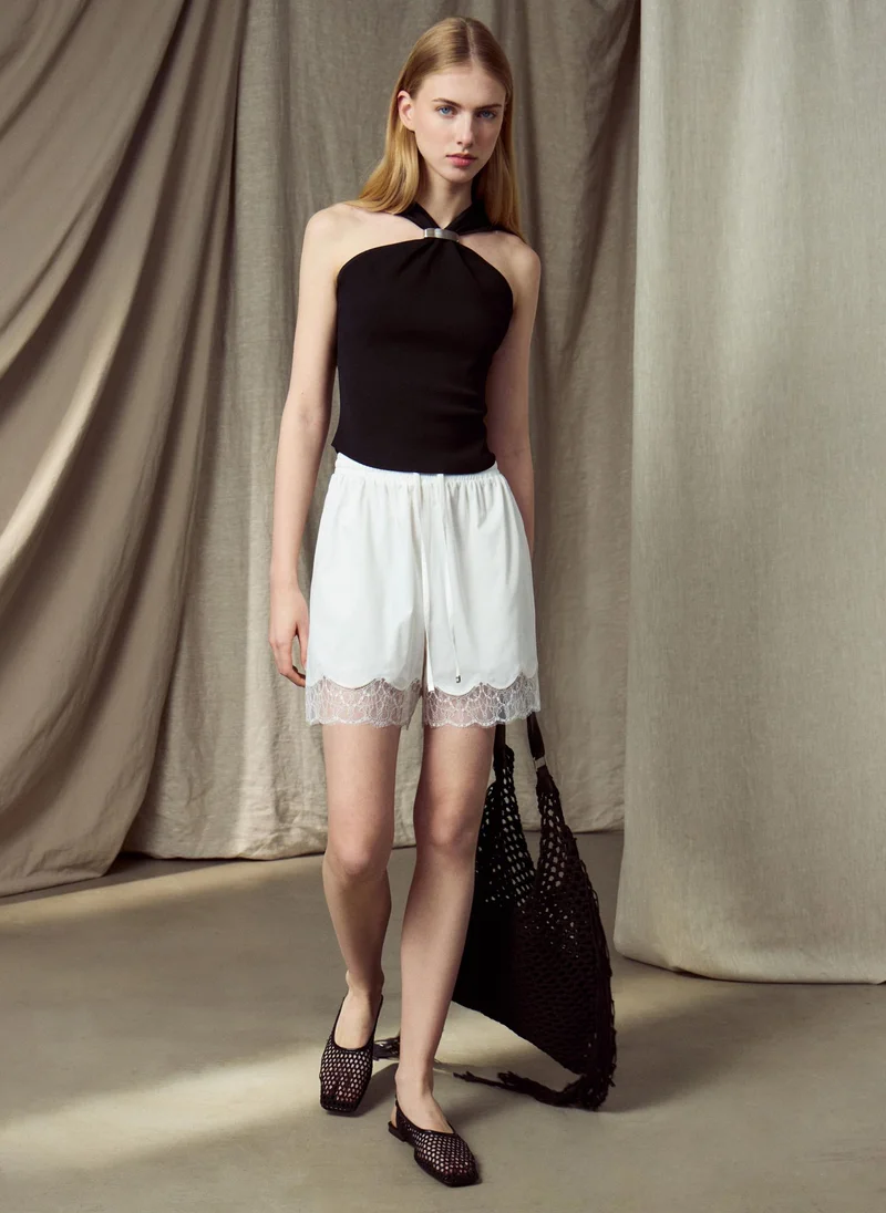 Lichi  Satin mini shorts with lace cuffs for Women | Best Price UAE