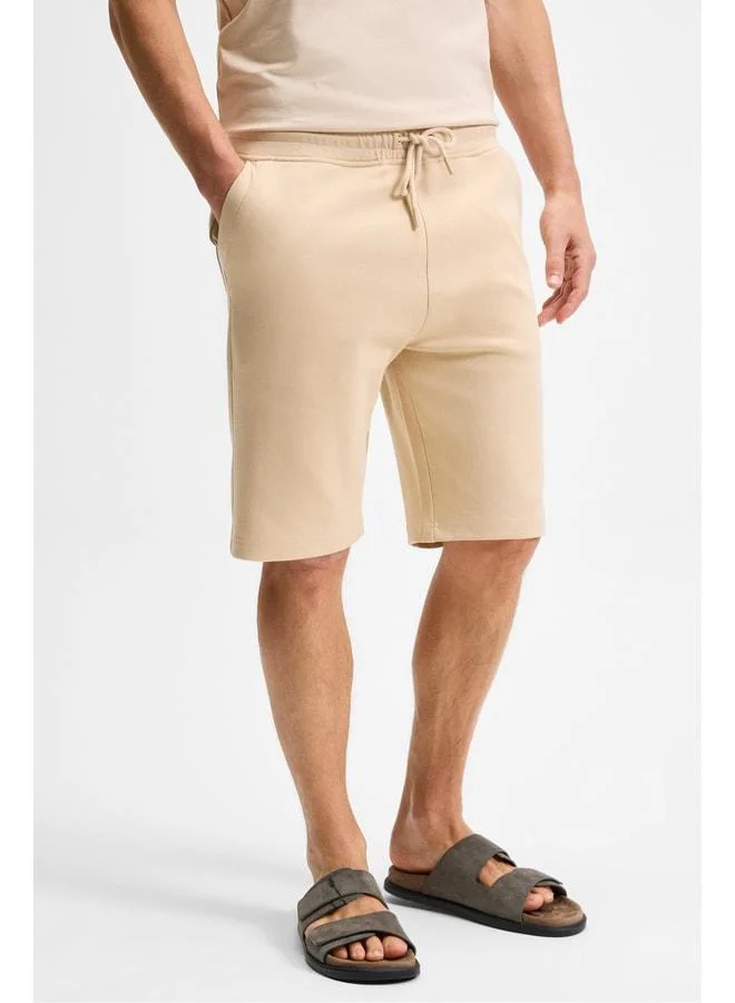 Grimelange CAMILO Men's Pocket Zip Elastic Waist Dark Beige Shorts & Bermuda.