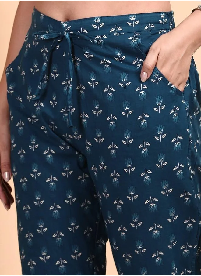 آي شين Three-Fourth Sleeve Women Blue Cotton Kurta Set with Embroidered pattern Tunic and Palazzo features a Round neckline and Three-Fourth Sleeve secured with Elastic closure and styled in Straight Fit ideal for Festive moments — designed to make heads turn.