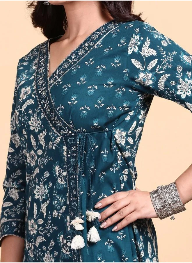 ISHIN Three-Fourth Sleeve Women Blue Cotton Kurta Set with Embroidered pattern Tunic and Palazzo features a Round neckline and Three-Fourth Sleeve secured with Elastic closure and styled in Straight Fit ideal for Festive moments — designed to make heads turn.