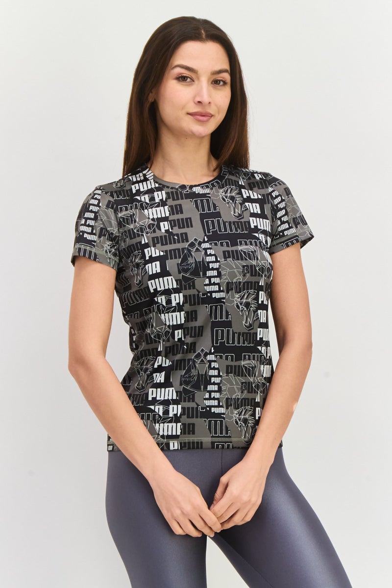 PUMA Women Sportswear Fit Short Sleeve Outdoor T-Shirt, Black Combo - Image 1