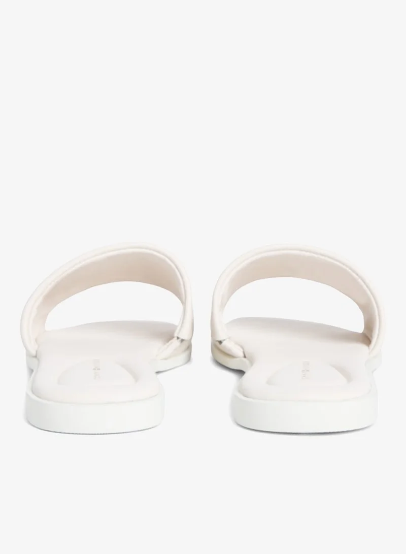 Tommy Hilfiger Soft Cream Leather TH Monogram Strap Mules for Women | Best Price UAE