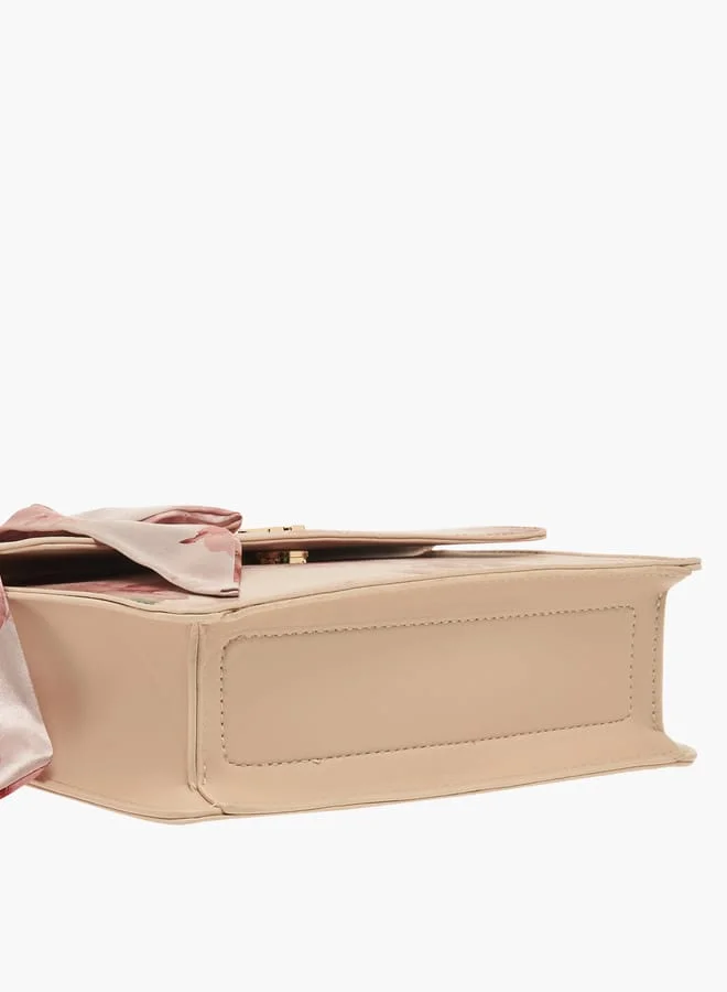 فلورا بيلا من شو إكسبرس Womens Floral Print Crossbody Bag With Scarf Accent And Magnetic Button Closure