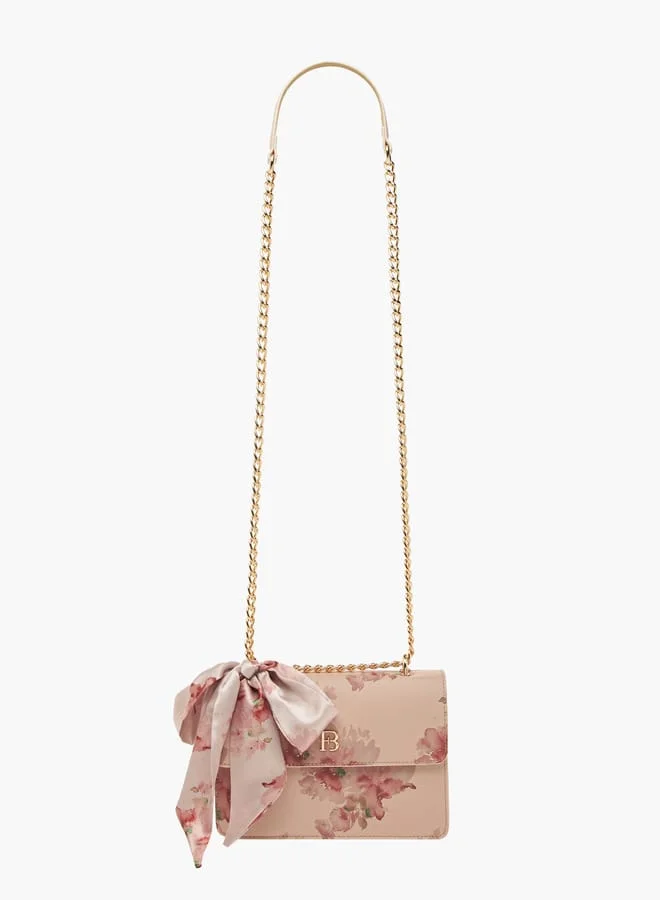 فلورا بيلا من شو إكسبرس Womens Floral Print Crossbody Bag With Scarf Accent And Magnetic Button Closure